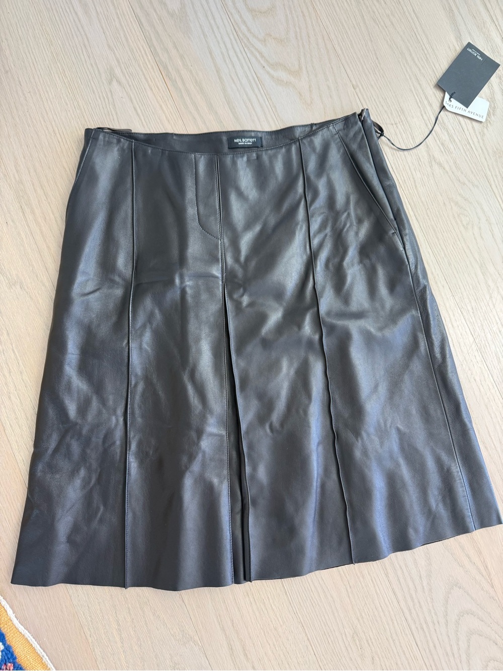 Neil Barrett brown leather size L skirt with original tags. 24 inches long